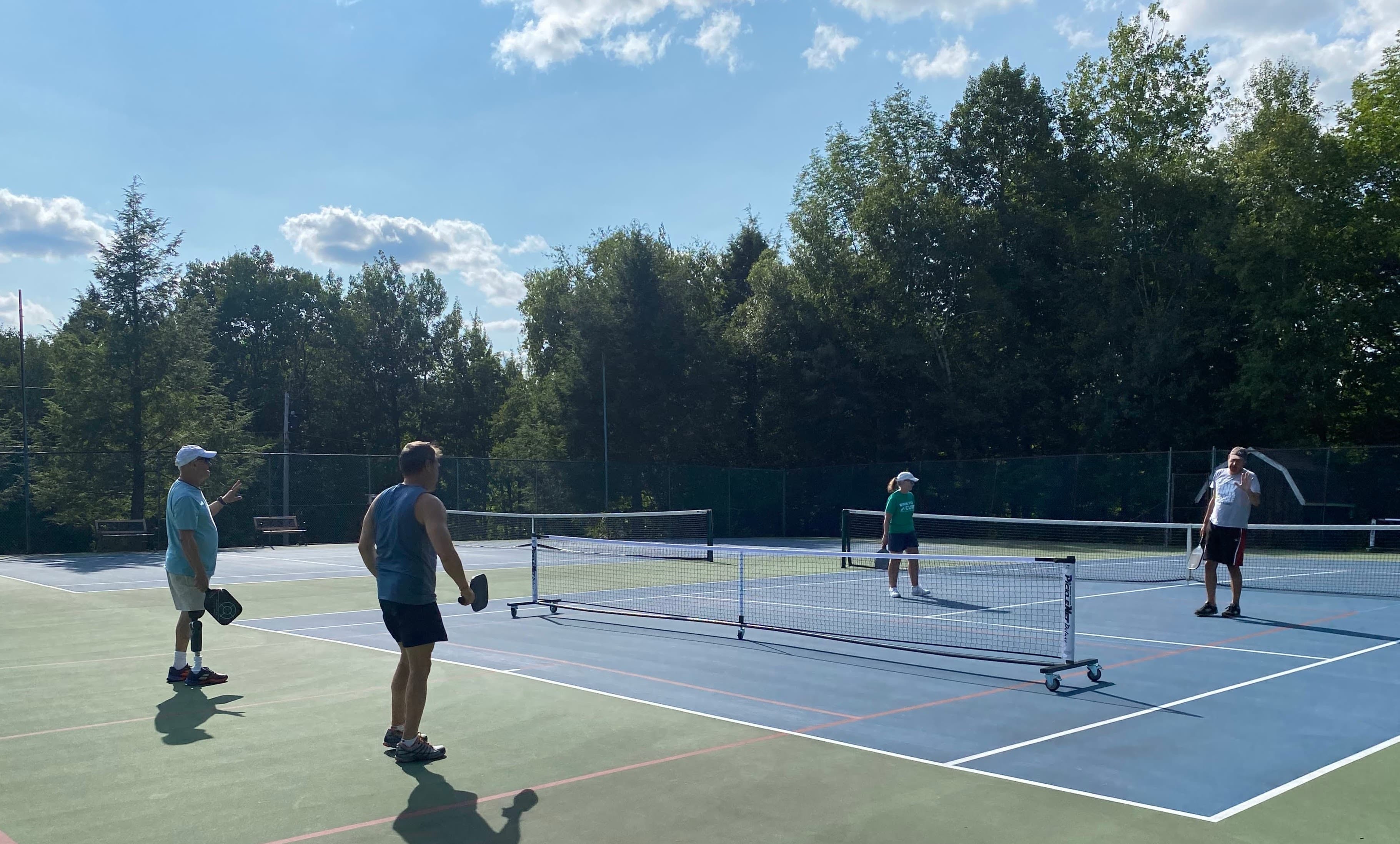 Pickleball game on a sunny day
